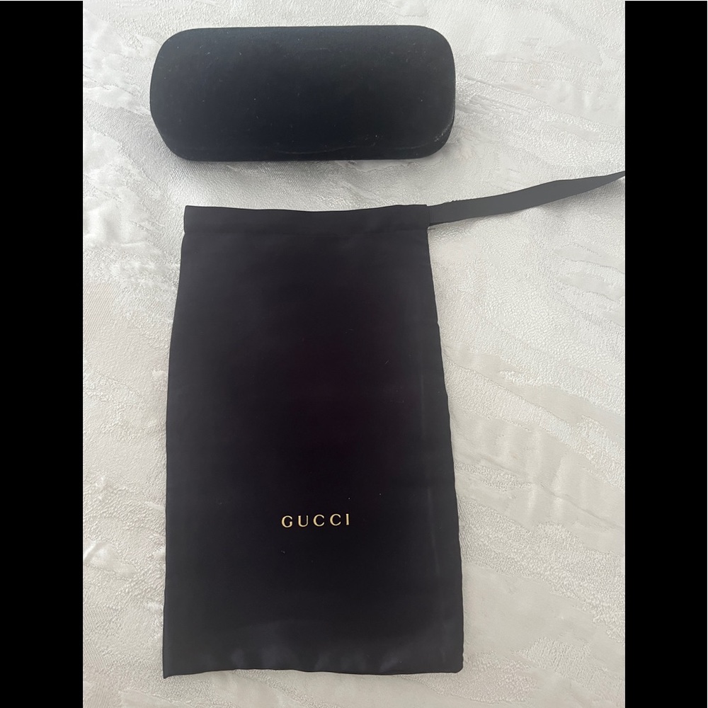 Gucci sunglass cases.